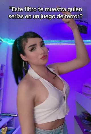 Wonderful Mirandah Shows Cleavage in White Crop Top