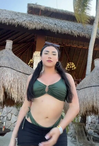 Luscious Mirandah Shows Cleavage in Green Bikini Top