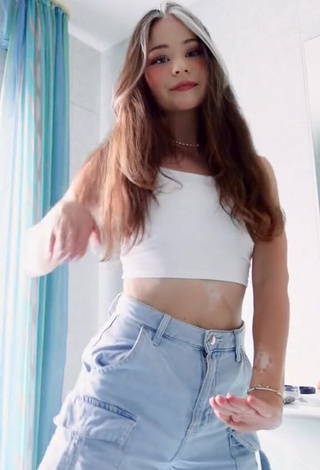 3. Seductive Nadine Breaty in White Crop Top