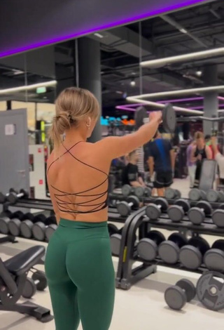 3. Sexy Niko_len in Green Leggings in the Sports Club while doing Sports Exercises