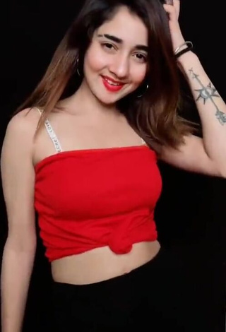 4. Titillating Nisha Bhatt in Red Crop Top