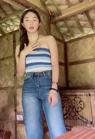 Sweetie Queenee Mercado Shows Cleavage in Striped Crop Top