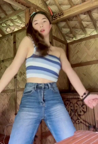 3. Sweetie Queenee Mercado Shows Cleavage in Striped Crop Top