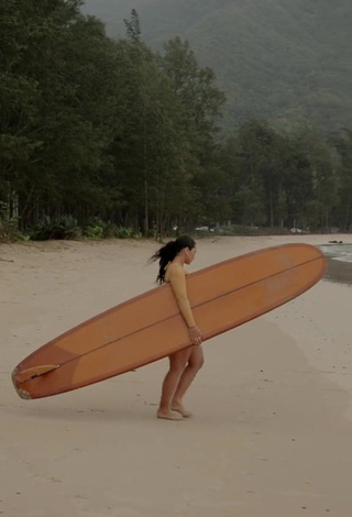 2. Sultry Sienna Mae Gomez Shows Cleavage in Swimsuit at the Beach