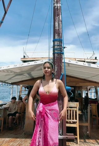 2. Sultry Angguncantik Shows Cleavage in Pink Swimsuit (Side Boob)