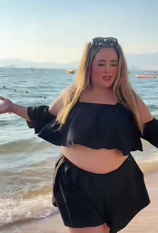 Maleja Rodriguez Shows Cleavage in Alluring Black Crop Top at the Beach while Twerking