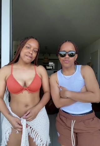 Sexy Treona & Trechelle Andino Shows Cleavage in Orange Bikini Top