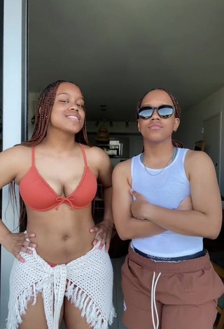 3. Sexy Treona & Trechelle Andino Shows Cleavage in Orange Bikini Top