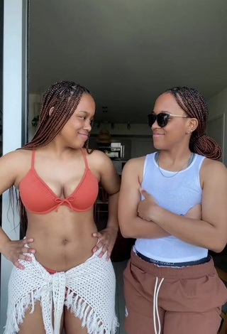 5. Sexy Treona & Trechelle Andino Shows Cleavage in Orange Bikini Top