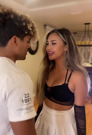 Star Abelar Shows Cleavage in Erotic Black Crop Top