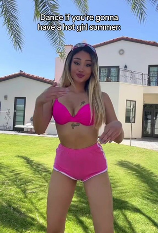 3. Sultry Star Abelar Shows Cleavage in Pink Bikini Top