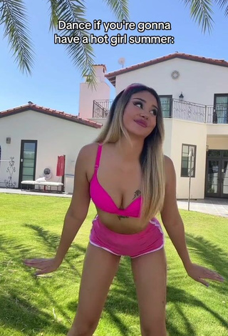 5. Sultry Star Abelar Shows Cleavage in Pink Bikini Top