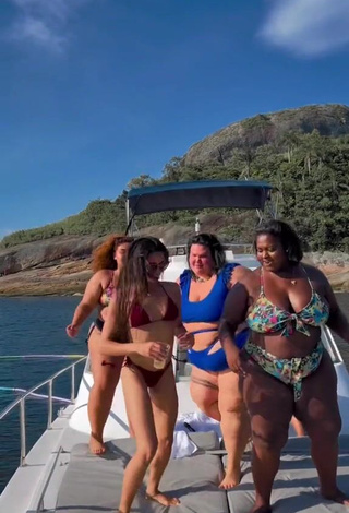 Luscious Thais Carla Shows Cleavage in Blue Swimsuit on a Boat