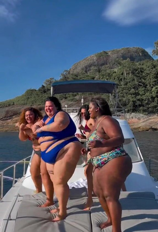 2. Luscious Thais Carla Shows Cleavage in Blue Swimsuit on a Boat