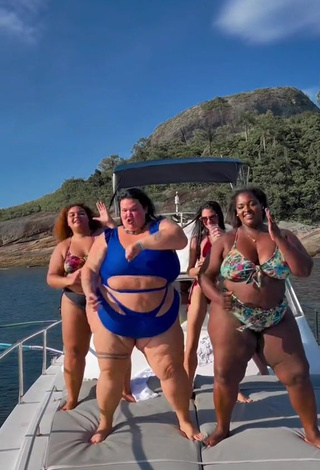 4. Luscious Thais Carla Shows Cleavage in Blue Swimsuit on a Boat