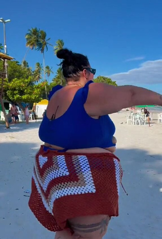 2. Magnetic Thais Carla Shows Cleavage in Appealing Blue Crop Top at the Beach