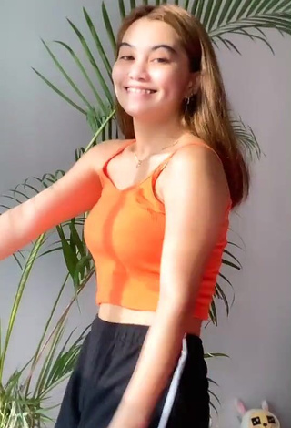 5. Vanessa Kate Alvarez Looks Fine in Orange Crop Top