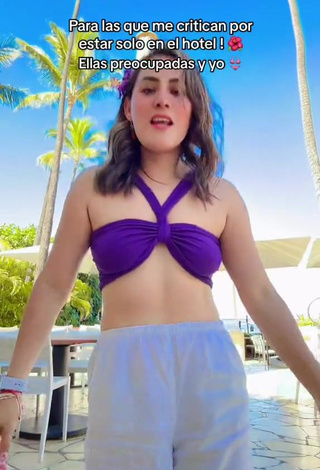 Titillating vasilvana1 Shows Cleavage in Purple Bikini Top