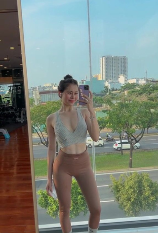 3. Sultry Việt Phương Thoa in Brown Leggings