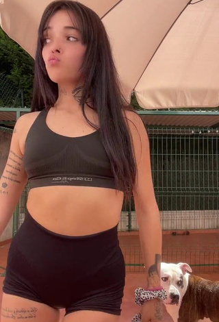 6. Luscious Xinni Xinnita Shows Cleavage in Black Sport Bra