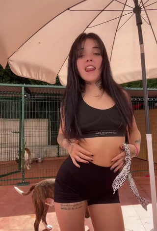 6. Sultry Xinni Xinnita in Black Sport Bra