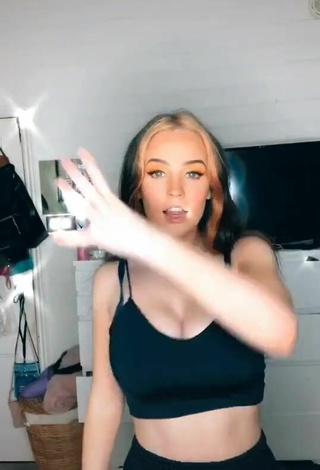 Sammy Janee Shows Cleavage in Sexy Black Crop Top