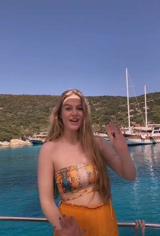 2. Sultry Tessa Bear in Snake Print Bikini Top on a Boat