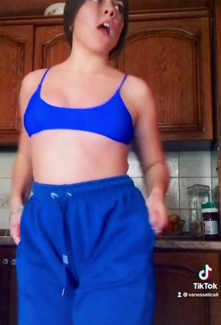 4. Sultry Vanessa Ticalli in Blue Crop Top