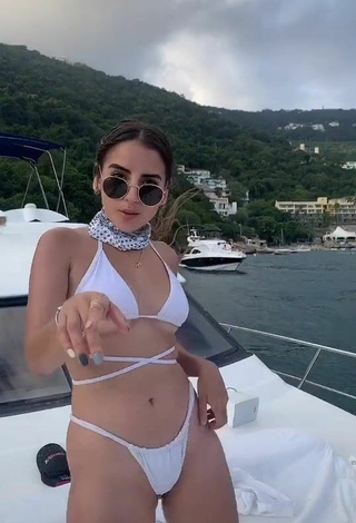 4. Sultry Diana Larume in White Bikini on a Boat