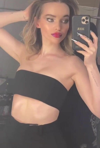 5. Sultry Dove Cameron in Black Tube Top