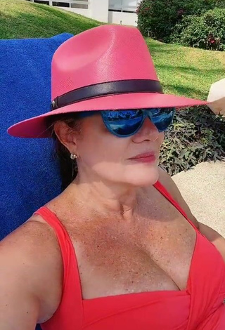 Sultry Erika Buenfil Shows Cleavage in Red Swimsuit