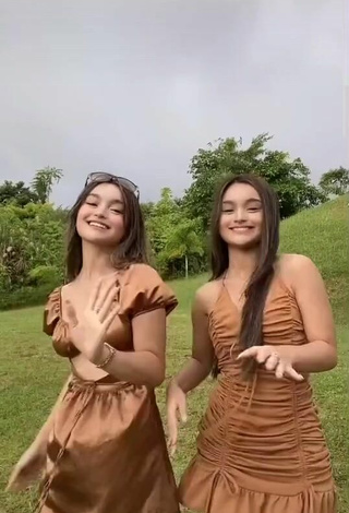 4. Sultry Aicy & Trisha Shinmari in Brown Dress