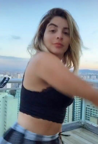 3. Luscious GKAY in Black Crop Top on the Balcony