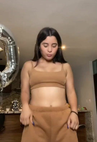 2. Luscious Michel Chavez in Beige Crop Top