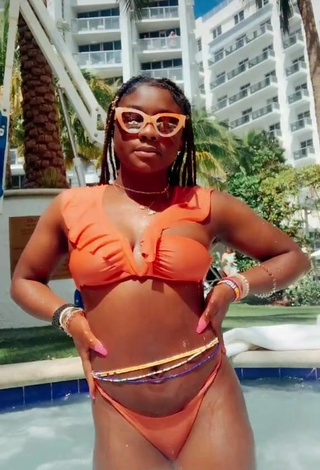 Sultry Aba Asante in Orange Bikini at the Swimming Pool