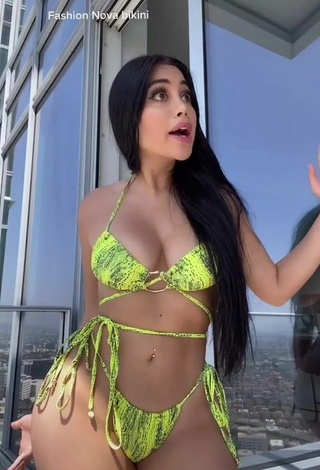 4. Titillating Jailyne Ojeda Ochoa in Snake Print Bikini on the Balcony (Underboob)