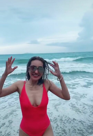 2. Sultry Jelai Andres in Red Swimsuit at the Beach