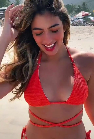 5. Sultry Júlia Puzzuoli in Red Bikini at the Beach