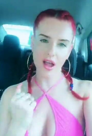 3. Sultry Justina Valentine Shows Cleavage in Pink Top in a Car