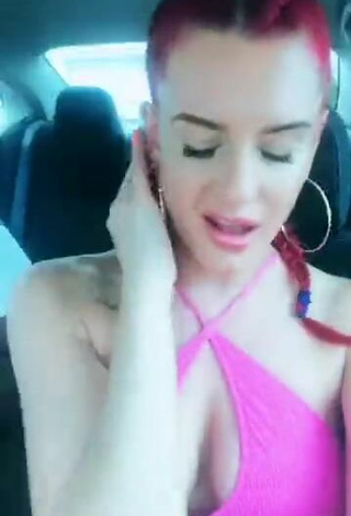 4. Sultry Justina Valentine Shows Cleavage in Pink Top in a Car