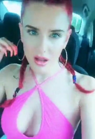 5. Sultry Justina Valentine Shows Cleavage in Pink Top in a Car