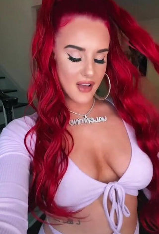 1. Sultry Justina Valentine Shows Cleavage in Purple Crop Top