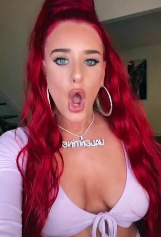 3. Sultry Justina Valentine Shows Cleavage in Purple Crop Top