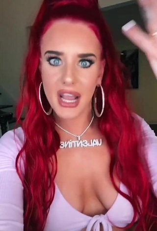 4. Sultry Justina Valentine Shows Cleavage in Purple Crop Top