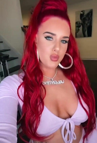 5. Sultry Justina Valentine Shows Cleavage in Purple Crop Top