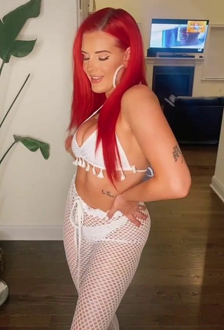 2. Titillating Justina Valentine Shows Cleavage in White Crop Top