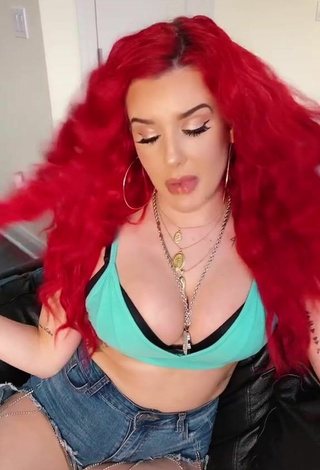 3. Cute Justina Valentine Shows Cleavage in Green Crop Top