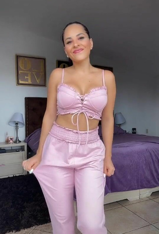 Titillating Karla Bustillos Shows Cleavage in Pink Crop Top