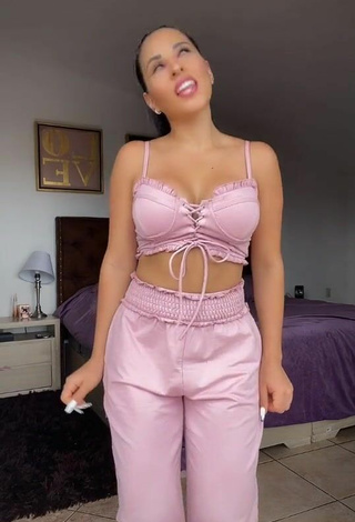 4. Titillating Karla Bustillos Shows Cleavage in Pink Crop Top