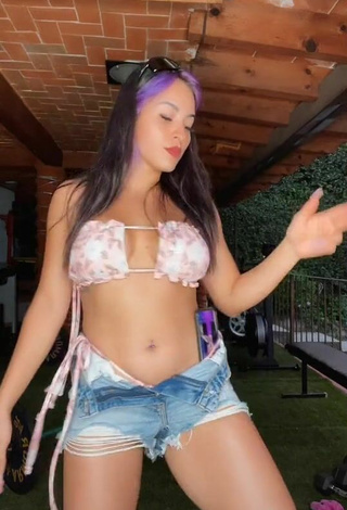 3. Sultry Karla Bustillos in Floral Bikini Top